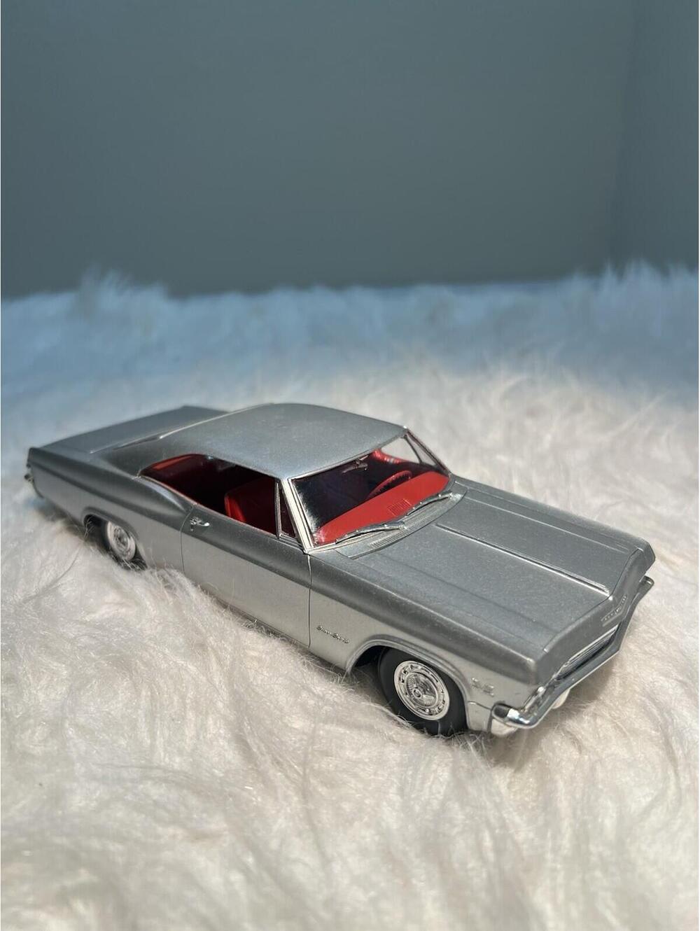 Scale model of a 1965 Silver Chevrolet Impala SS